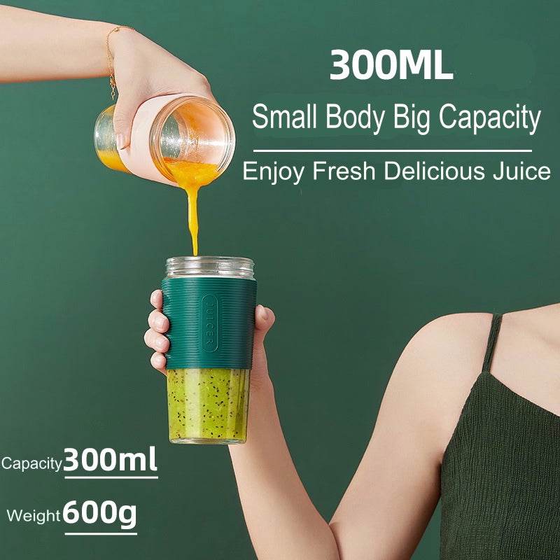 Green portable blender with a 300ml capacity, detachable bottle design, and stainless steel base.