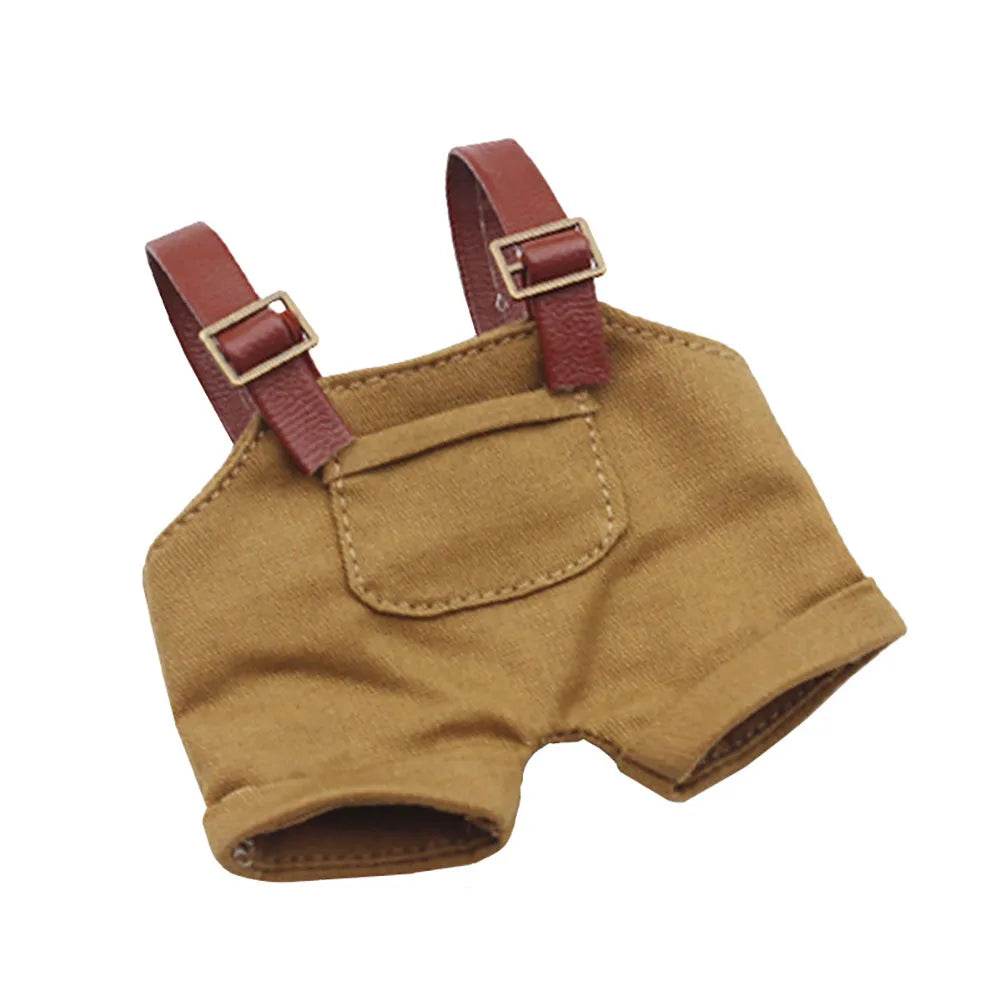 Brown canvas striped overalls with adjustable dark brown straps and front pocket for 17cm dolls.