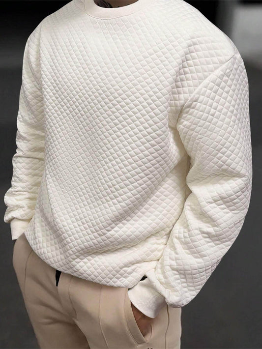 Apricot quilted long sleeve sweatshirt with drop shoulders and relaxed fit.