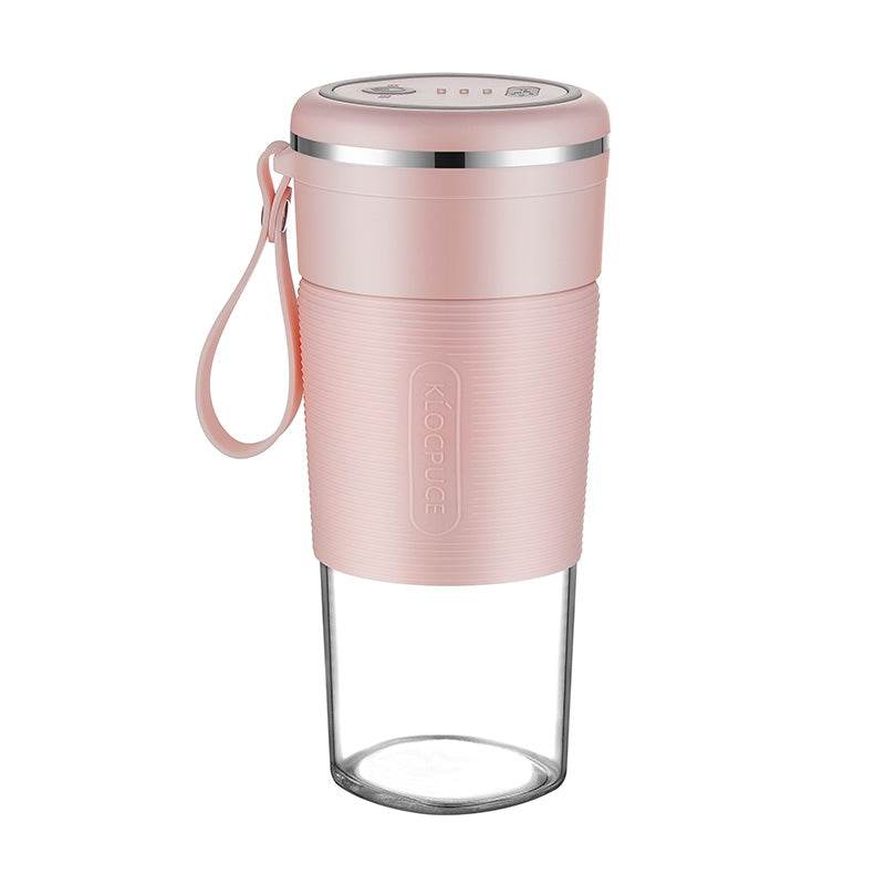 Pink portable blender with silver rim, textured grip, and detachable clear blending cup.