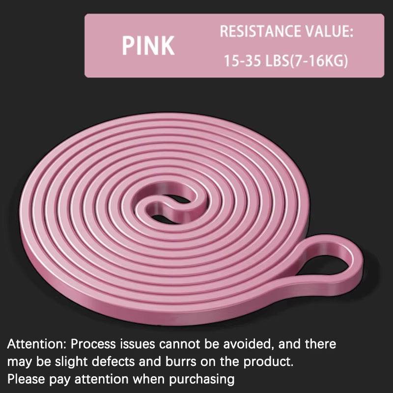 Coiled pink resistance band with 15-35 lbs stretch strength on dark background.