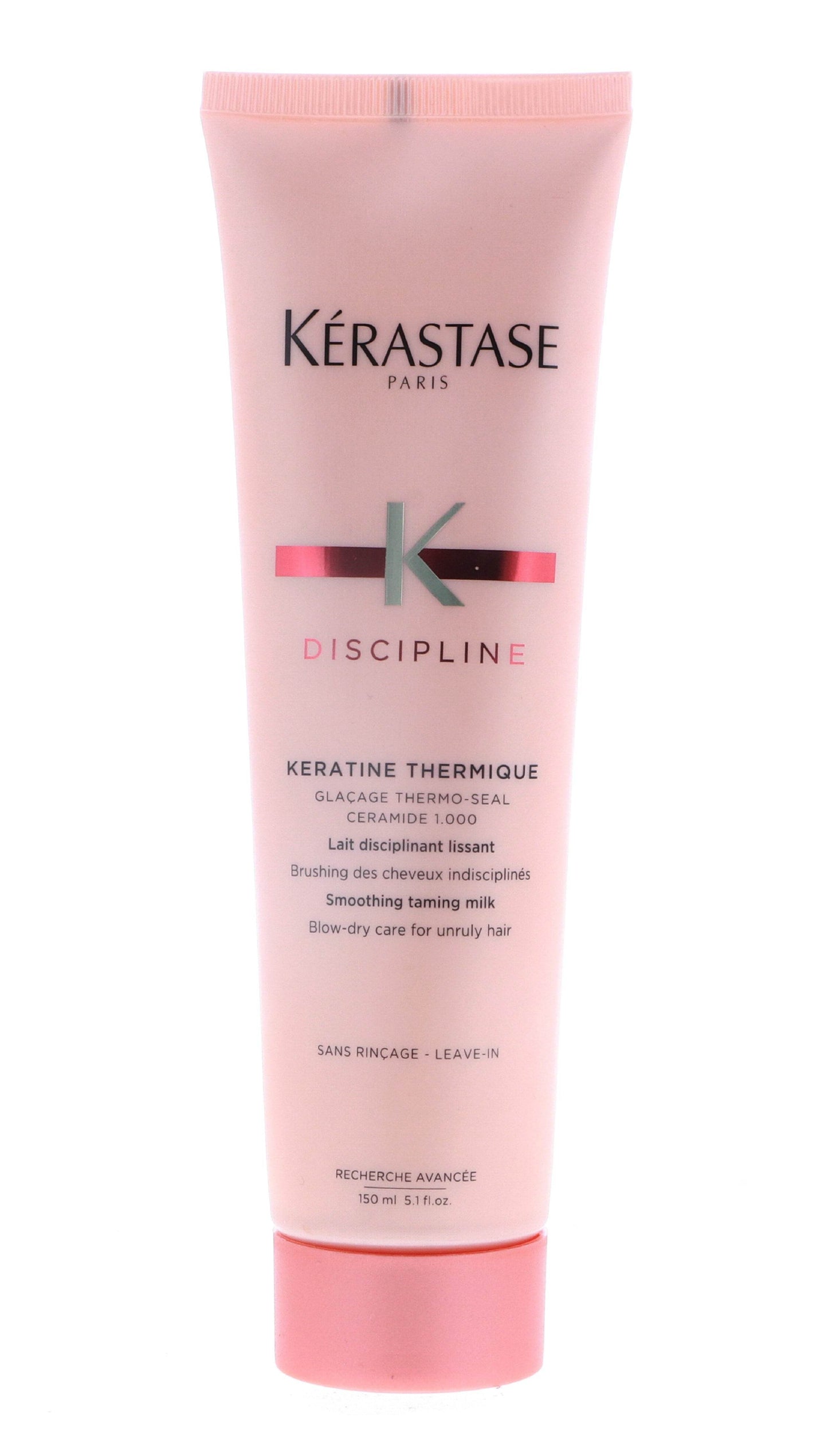 Pink tube of Kerastase Discipline Keratine Thermique smoothing taming milk with black and silver text, 5.1 oz.
