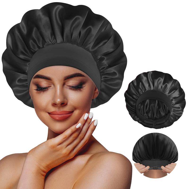 Black double-layer reversible satin bonnet with a wide elastic band modeled by a woman.