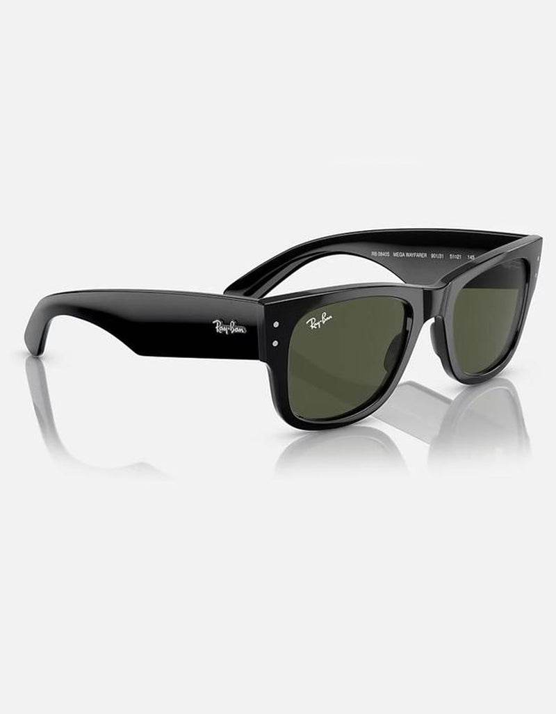 Black oversized Wayfarer sunglasses with dark green lenses and glossy frames.