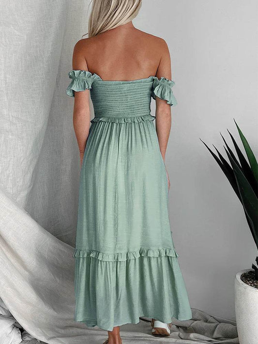 Light green off-shoulder mid-length dress with backless design and ruffled sleeves.