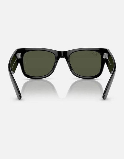 Black oversized wayfarer sunglasses with dark green lenses and thick glossy frames.