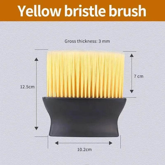 Yellow soft bristle brush with black ergonomic handle measuring 12.5cm tall and 10.2cm wide.