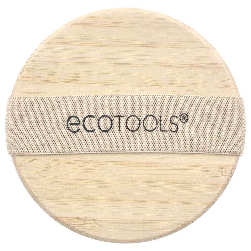 Round wooden dry body brush with natural bristles and beige elastic strap labeled Ecotools.