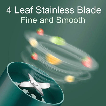 Green portable blender with four stainless steel blades inside the blending container.