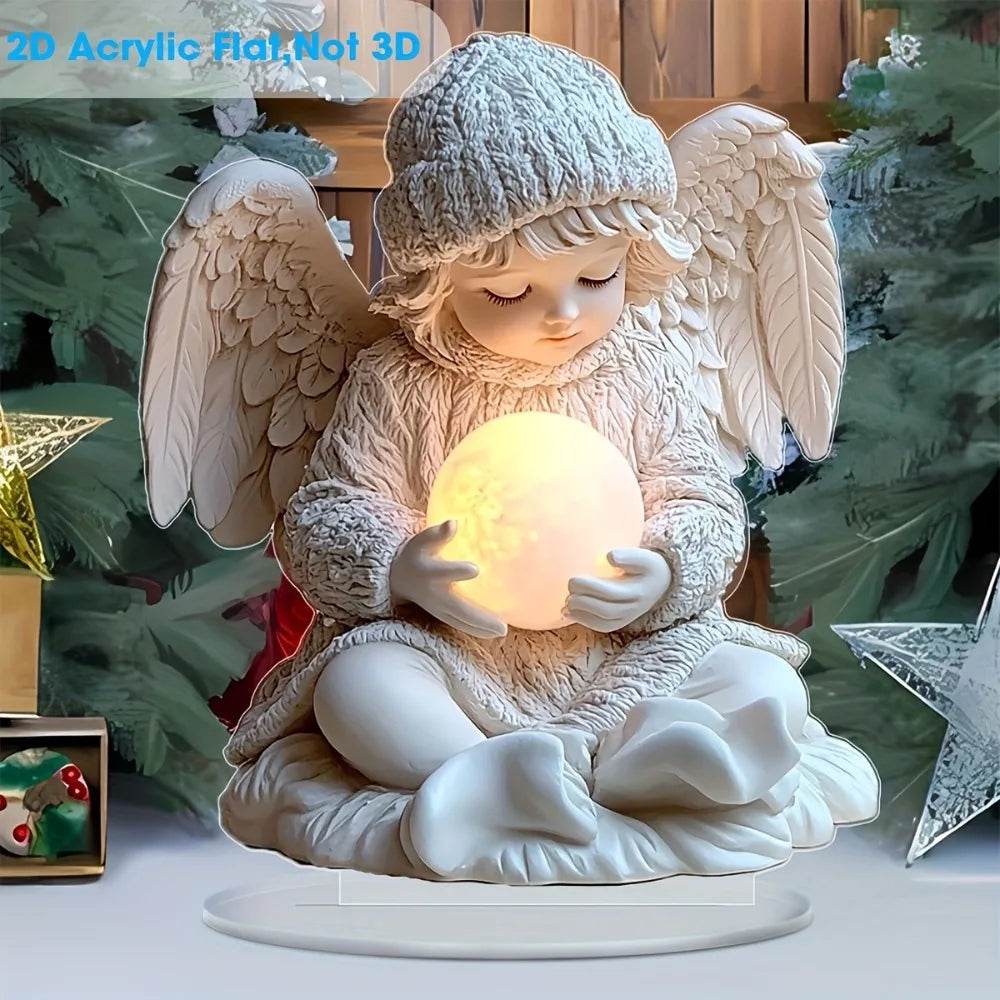 White 2D angel figurine holding a glowing acrylic orb, wearing a knit hat, seated on a round pedestal.