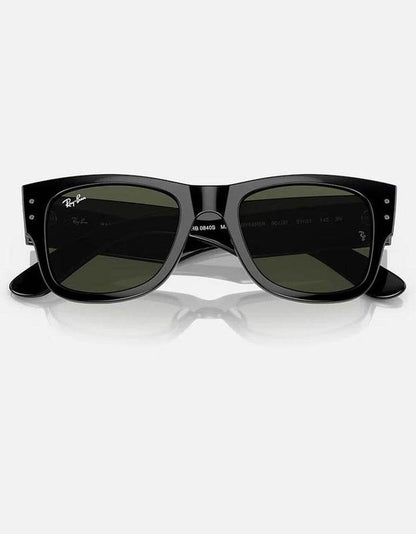 Black oversized Wayfarer sunglasses with dark green lenses and shiny acetate frames.