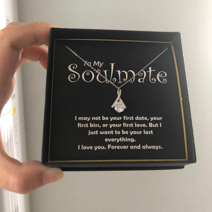 Silver heart pendant necklace with "To My Soulmate" engraved on black card inside black gift box.