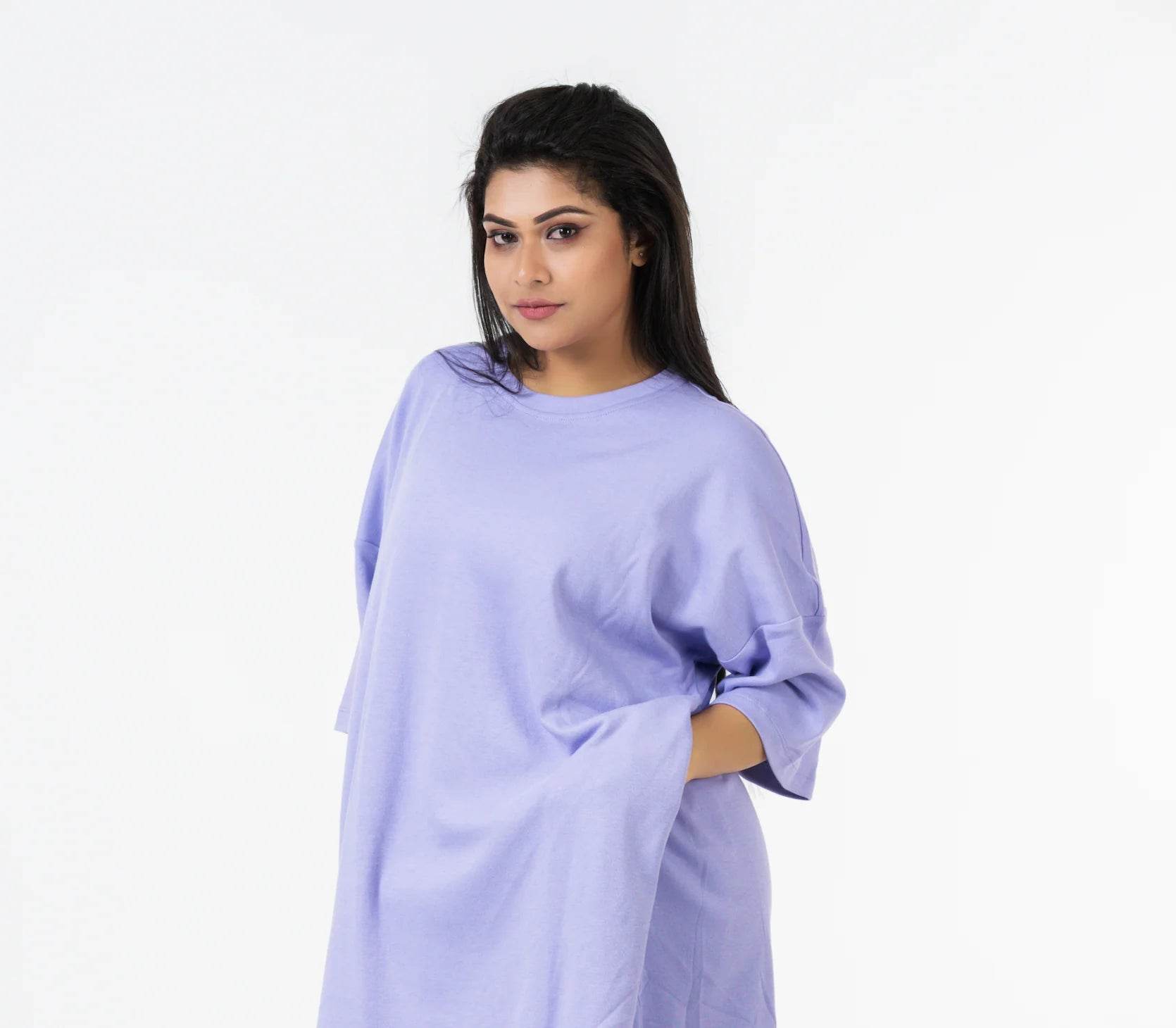 Lavender relaxed fit t-shirt with dropped shoulders and short sleeves worn by female model.