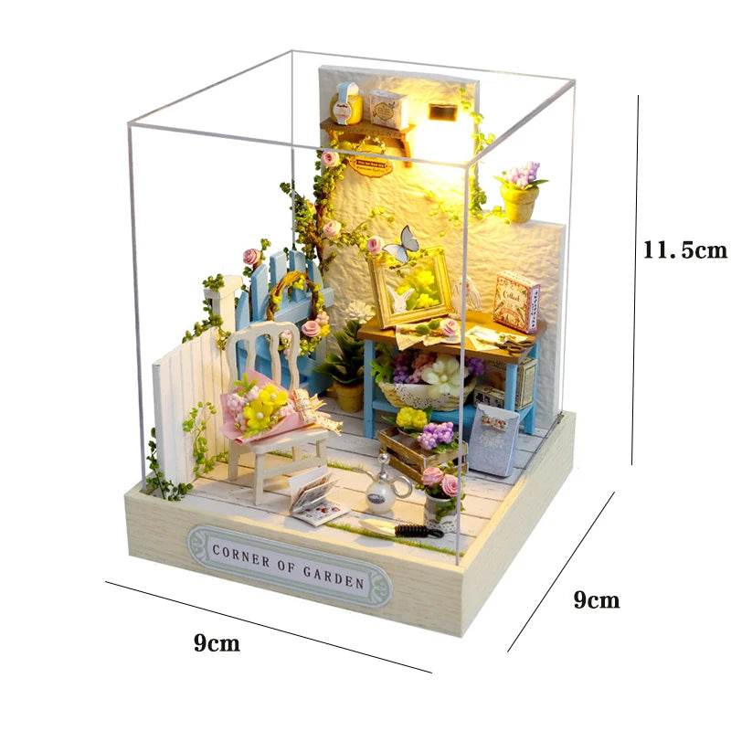 Mini 3D dollhouse flower shop with detailed furniture, plants, and garden decor in pastel blue and white tones.