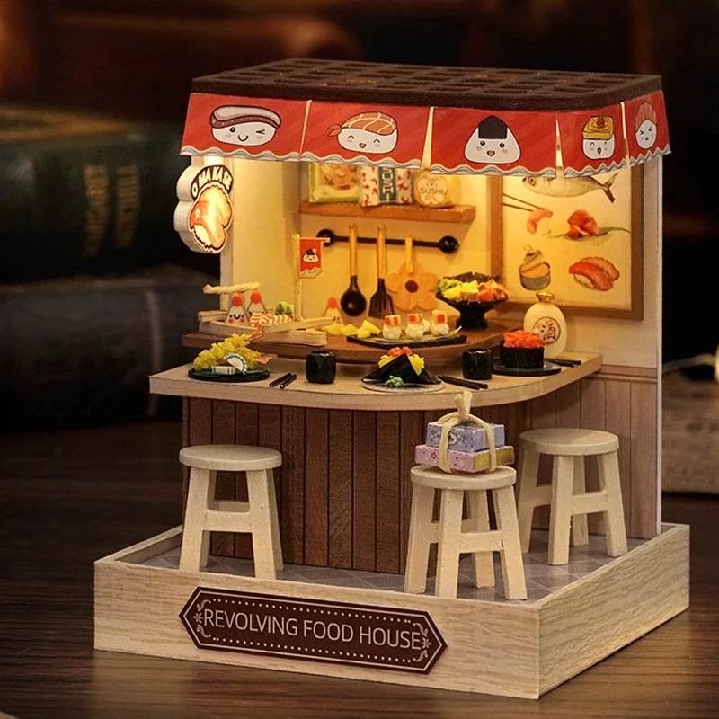 Miniature 3D DIY flower house kitchen with wooden stools, hanging pots, and fruit decals.