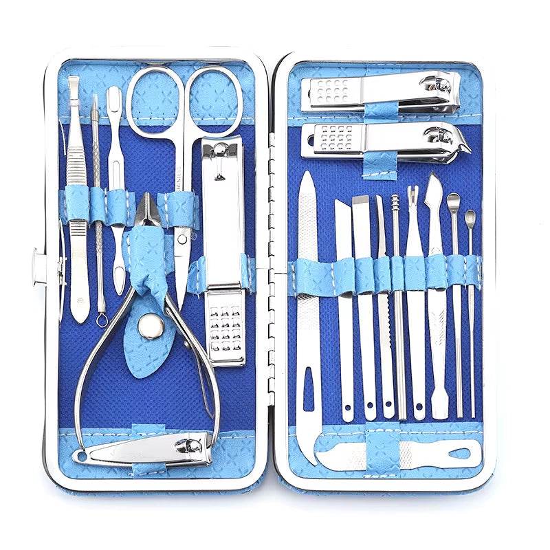 Open silver travel grooming kit with blue interior holding 19 stainless steel manicure and pedicure tools.