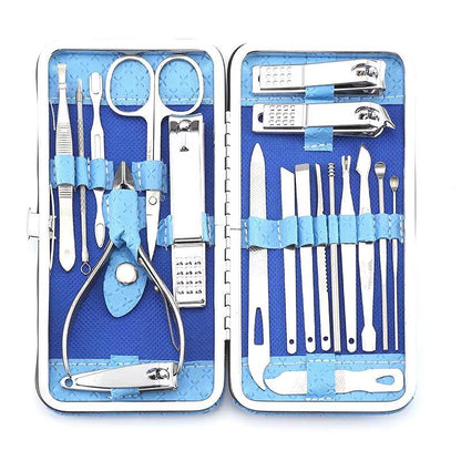 Open silver travel grooming kit with blue interior holding 19 stainless steel manicure and pedicure tools.