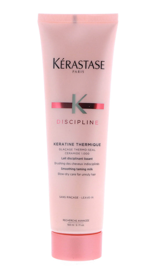 Pink tube of Kerastase Discipline Keratine Thermique smoothing taming milk with black and silver text, 5.1 oz.