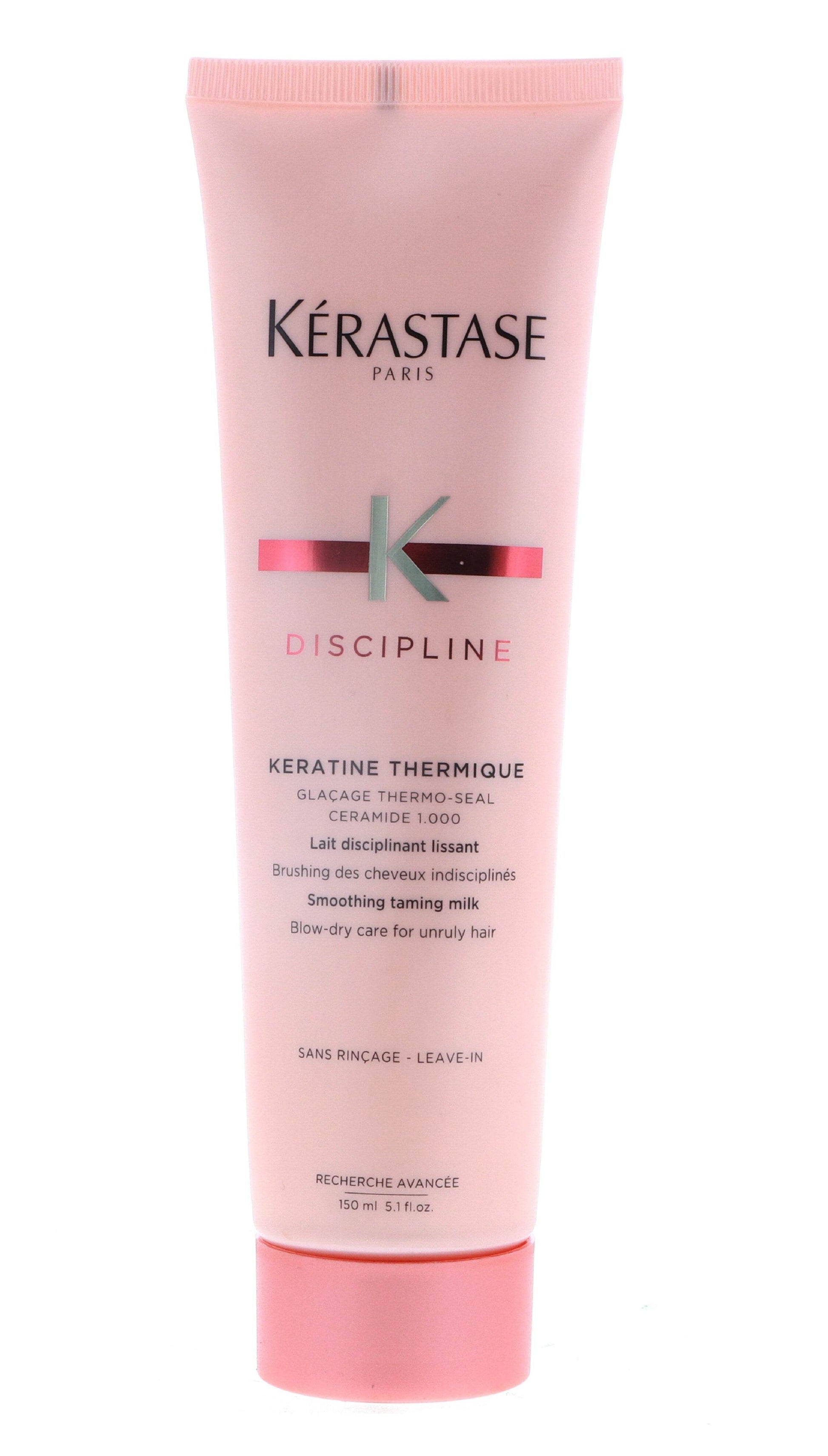 Kérastase Discipline Keratine Thermique Smoothing Taming Milk in pink tube with black and green logo, 5.1 oz.