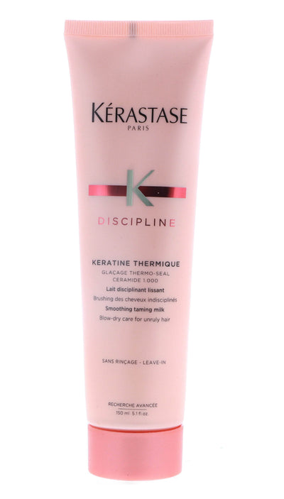 Kérastase Discipline Keratine Thermique Smoothing Taming Milk in pink tube with black and green logo, 5.1 oz.