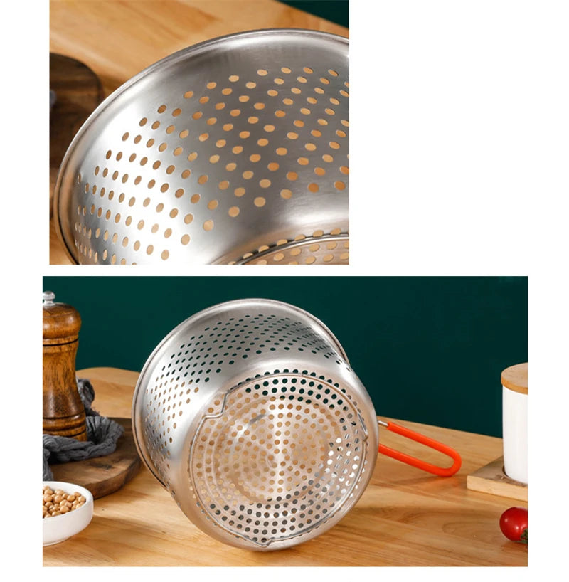 Metal colander with perforated design on a wooden surface