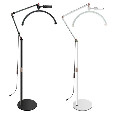 Two adjustable floor lamps, one black and one white, on a white background.