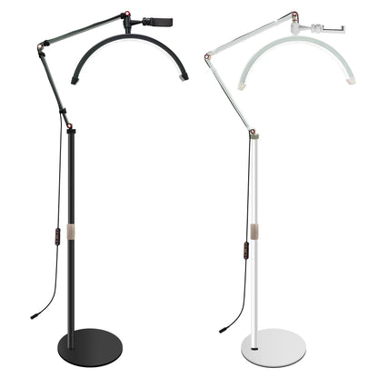 Two adjustable floor lamps, one black and one white, on a white background.