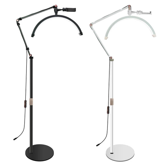 Two adjustable floor lamps, one black and one white, on a white background.