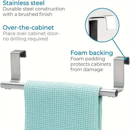 Over-the-cabinet towel bar with stainless steel construction and foam backing, featuring a close-up of the hook and text describing features.