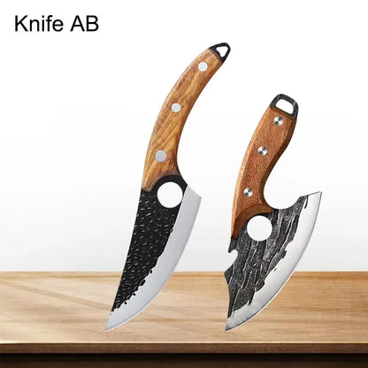 Two knives with wooden handles on a wooden surface and white background