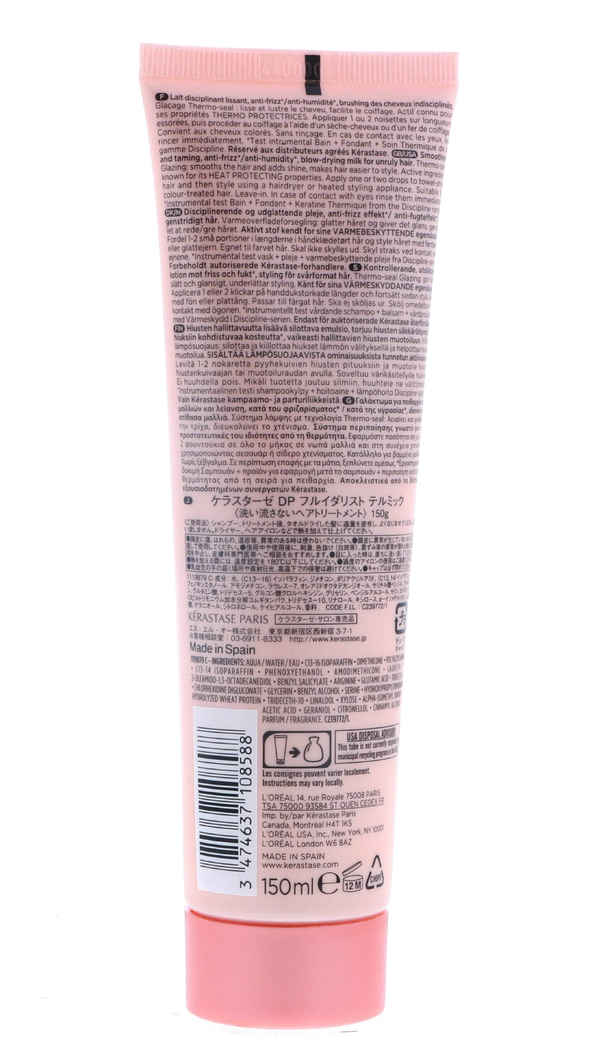 Pink tube of Discipline Keratine Thermique Smoothing Taming Milk with black text on the back.