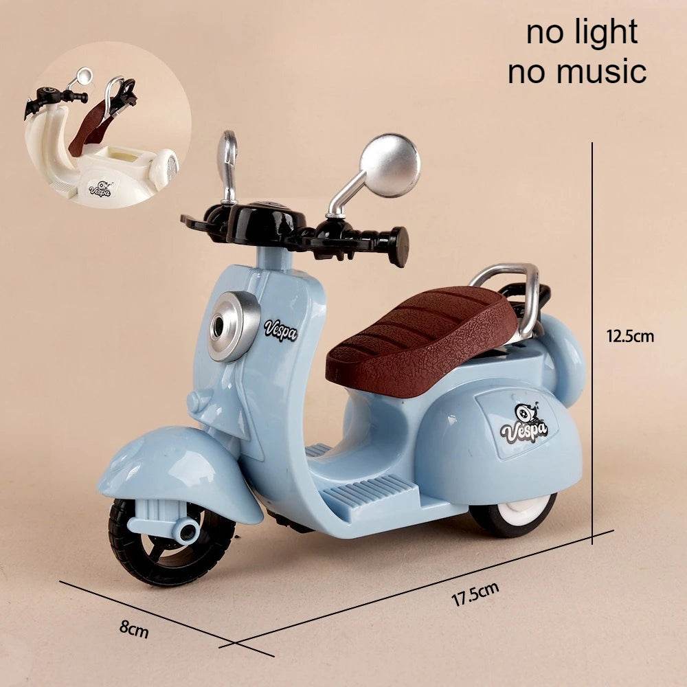 Mini blue electric toy motorcycle with brown seat, black handles, and round headlight.