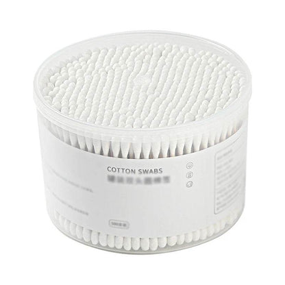 Clear round plastic container filled with 500 double-ended white cotton swabs.