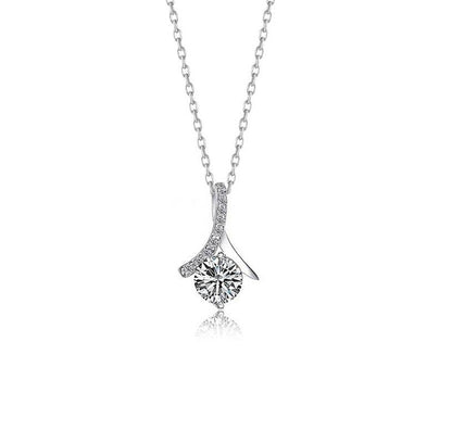 Silver pendant necklace with twisted design and single sparkling round crystal.