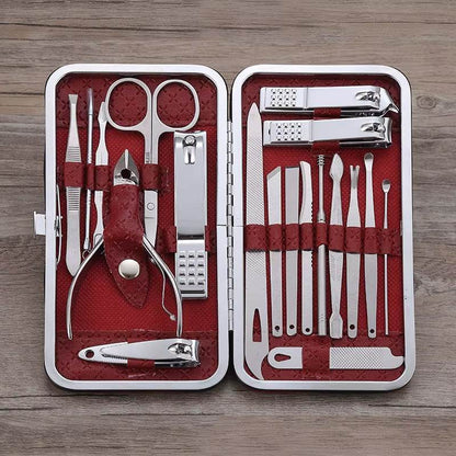 Black travel grooming kit with 19 stainless steel manicure and pedicure tools in a leather case.