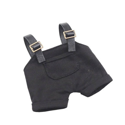 Black mini doll overalls with adjustable straps and small front pocket.