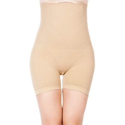 Beige high waist compression shapewear shorts with thigh control and smooth finish.