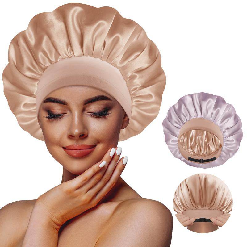 Reversible satin sleeping bonnet in champagne and grey with elastic band, worn by a woman with smooth skin and subtle.
