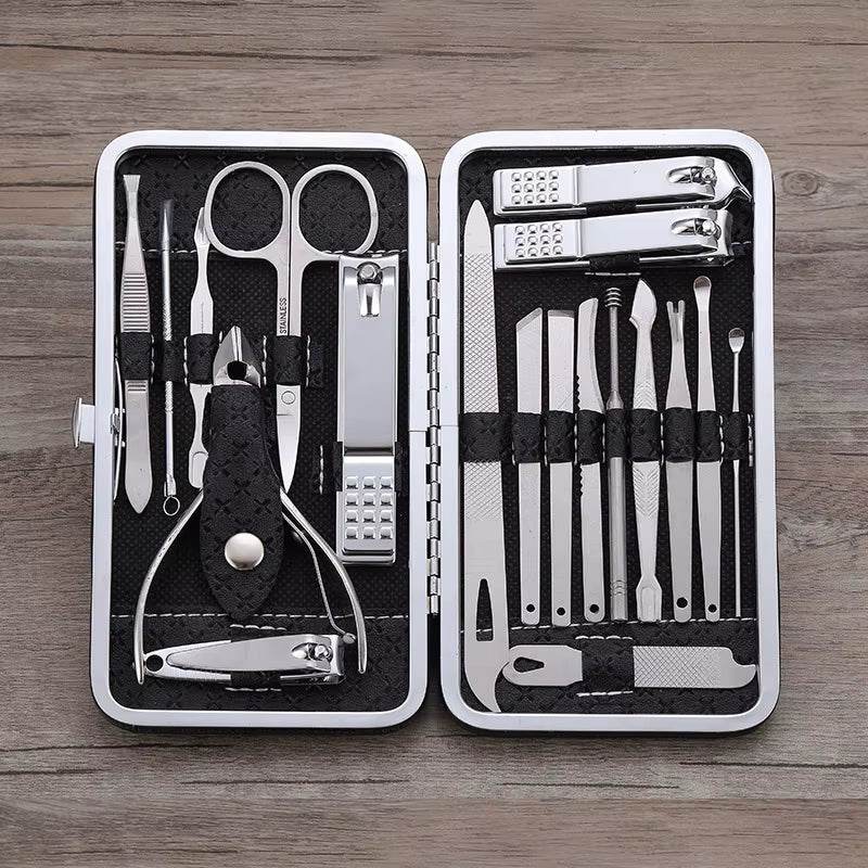 Black travel grooming kit with 19 stainless steel manicure and pedicure tools in a slim case.