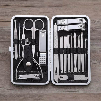 Black travel grooming kit with 19 stainless steel manicure and pedicure tools in a slim case.